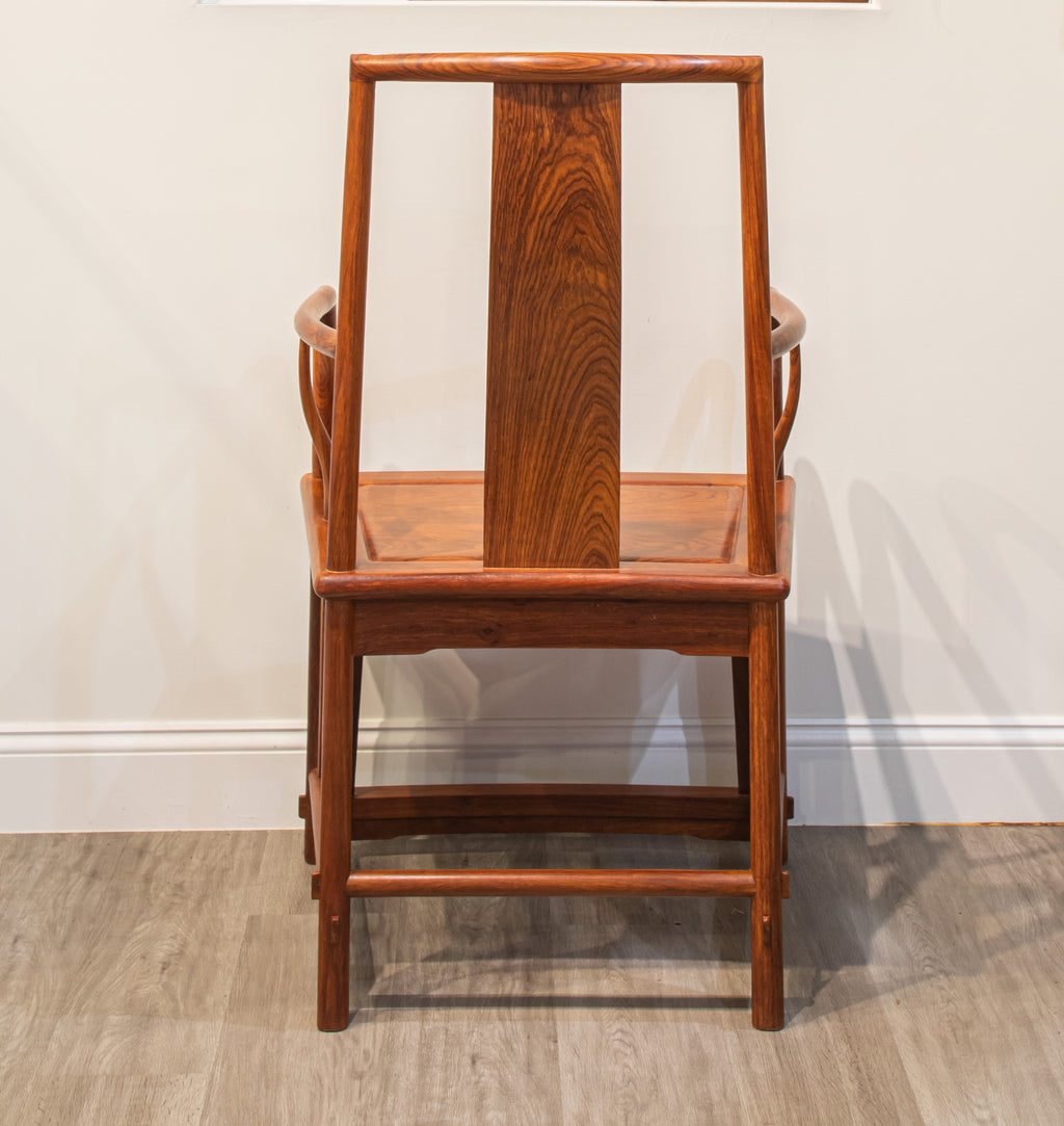 A Set Of Chinese Rosewood Yokeback Armchairs