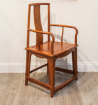 A Set Of Chinese Rosewood Yokeback Armchairs