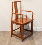 A Set Of Chinese Rosewood Yokeback Armchairs