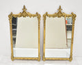 Pair Of Carved And Gilt Mirrors