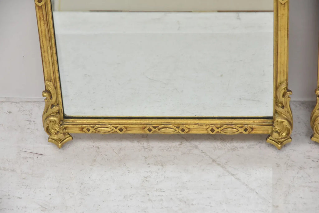 Pair Of Carved And Gilt Mirrors