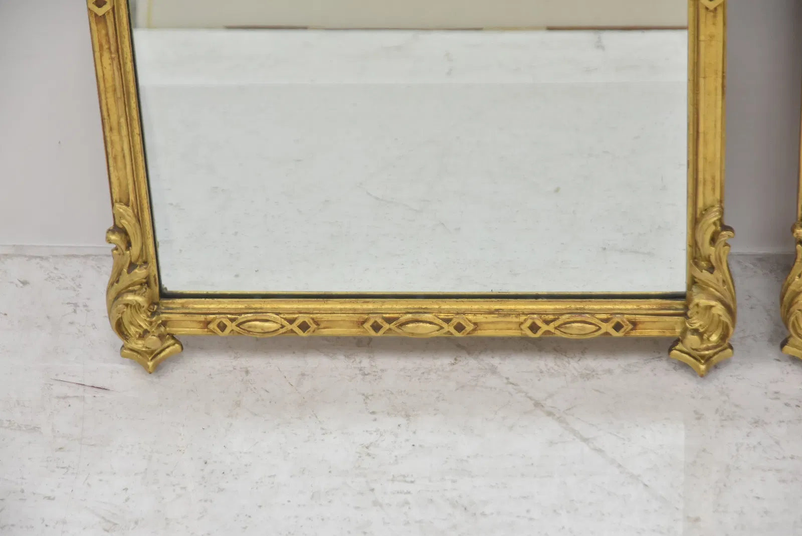 Pair Of Carved And Gilt Mirrors