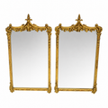 Pair Of Carved And Gilt Mirrors