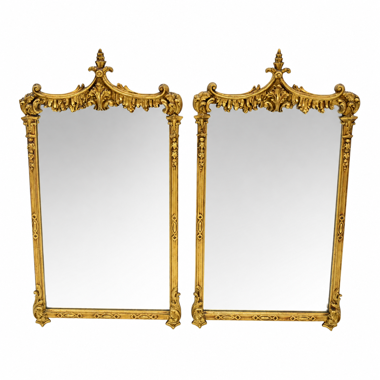 Pair Of Carved And Gilt Mirrors