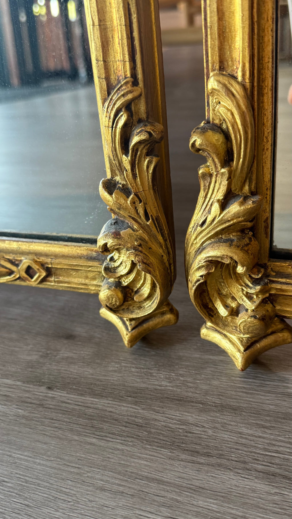 Pair Of Carved And Gilt Mirrors