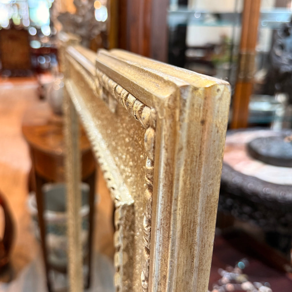 A Rectangular Mirror with Textured Frame