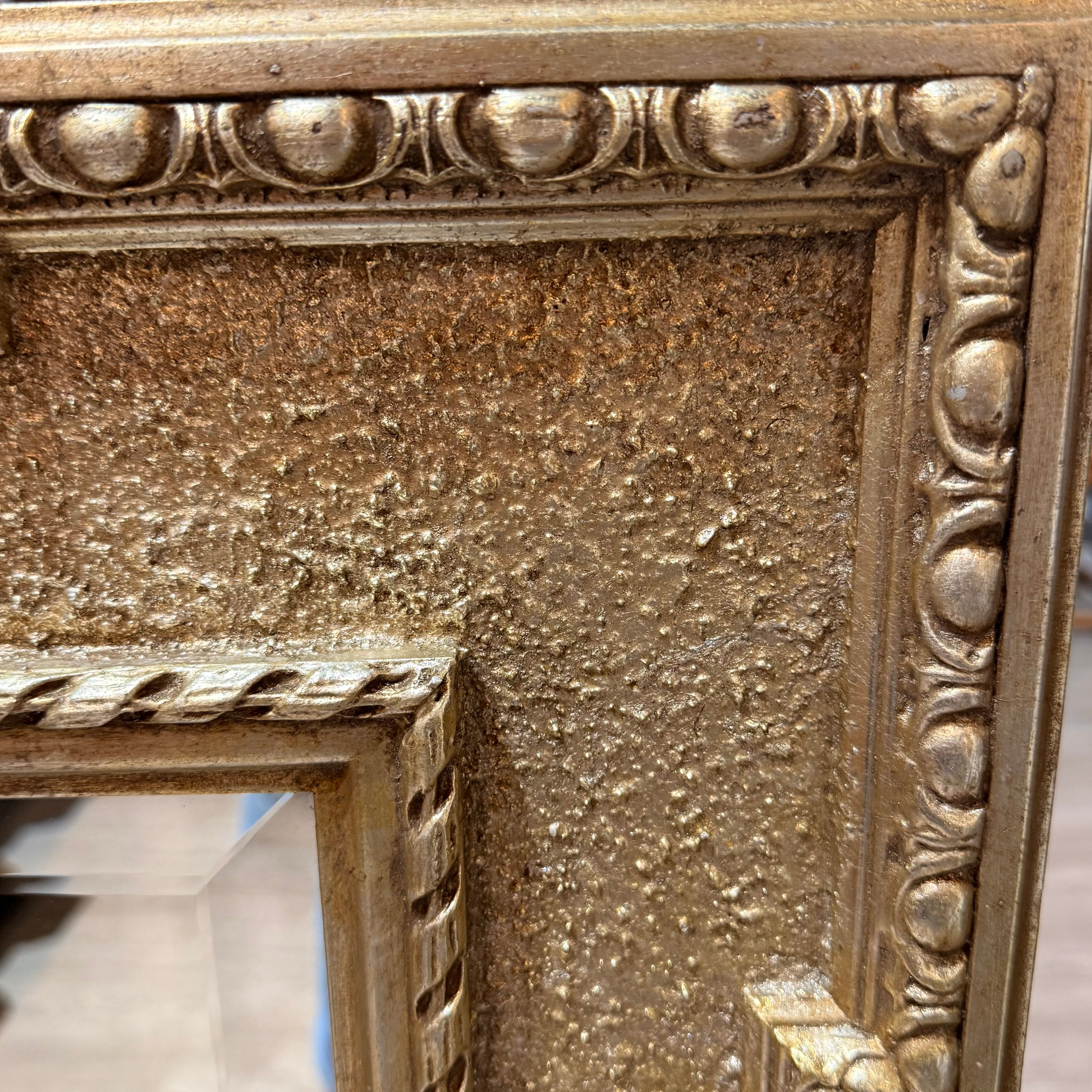 A Rectangular Mirror with Textured Frame