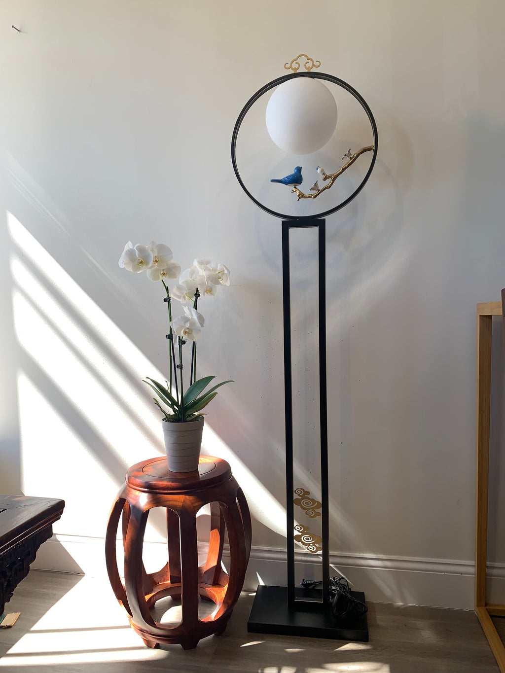 Zen-style floor lantern with a Bird