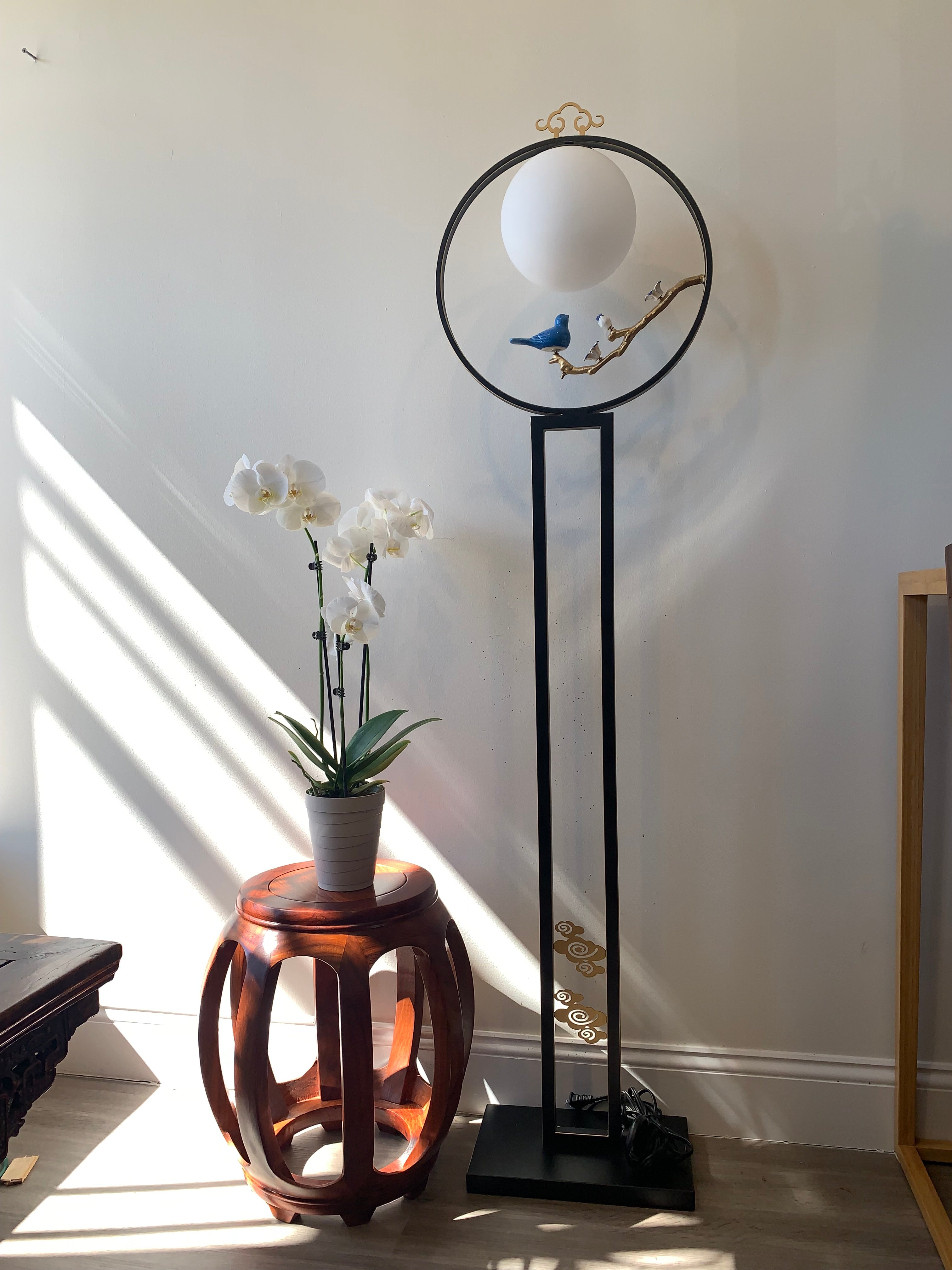 Zen-style floor lantern with a Bird