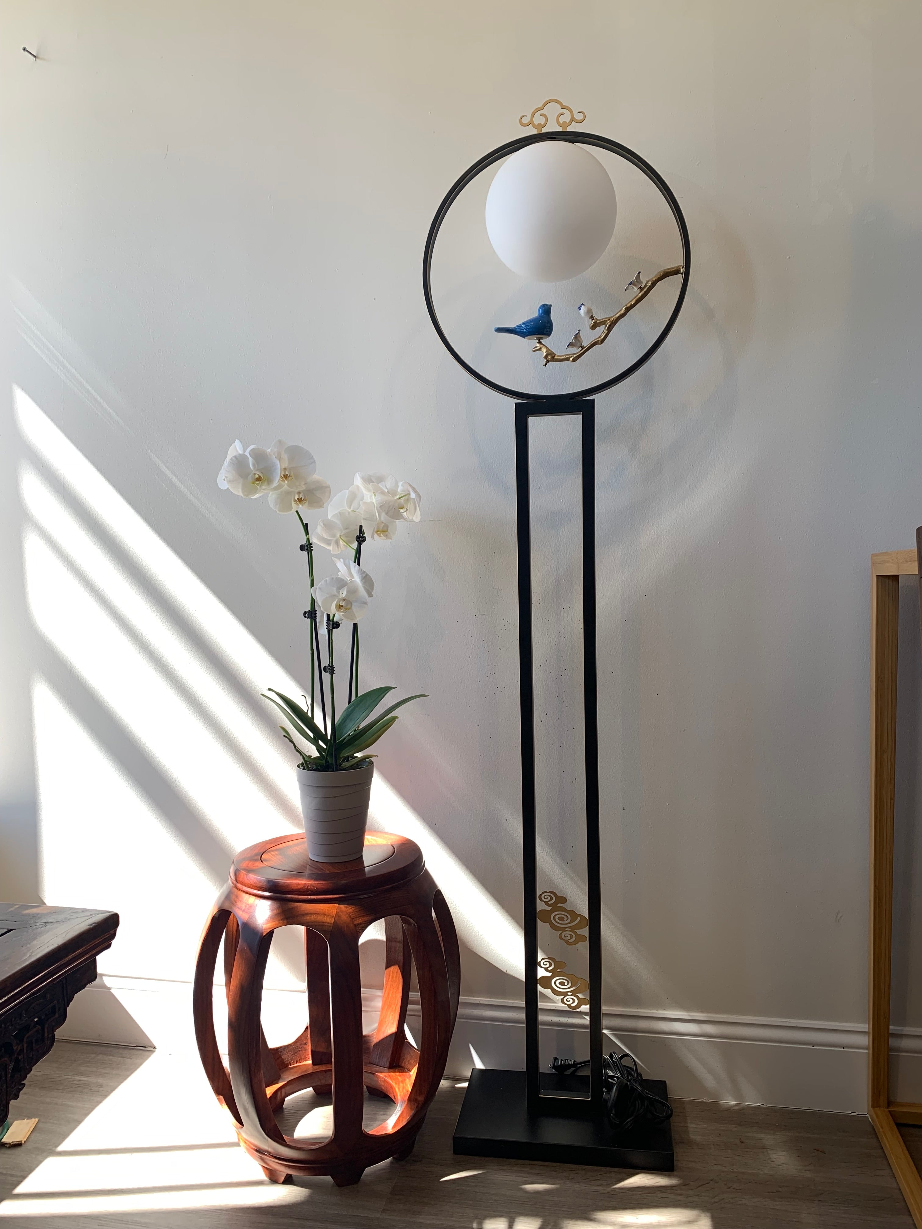 Zen-style floor lantern with a Bird