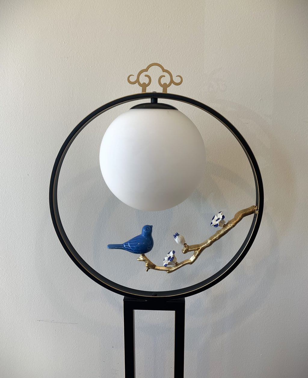 Zen-style floor lantern with a Bird