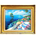 A framed painting depicting a vibrant tropical scene with palm trees, a blue ocean, and a colorful beachside town.