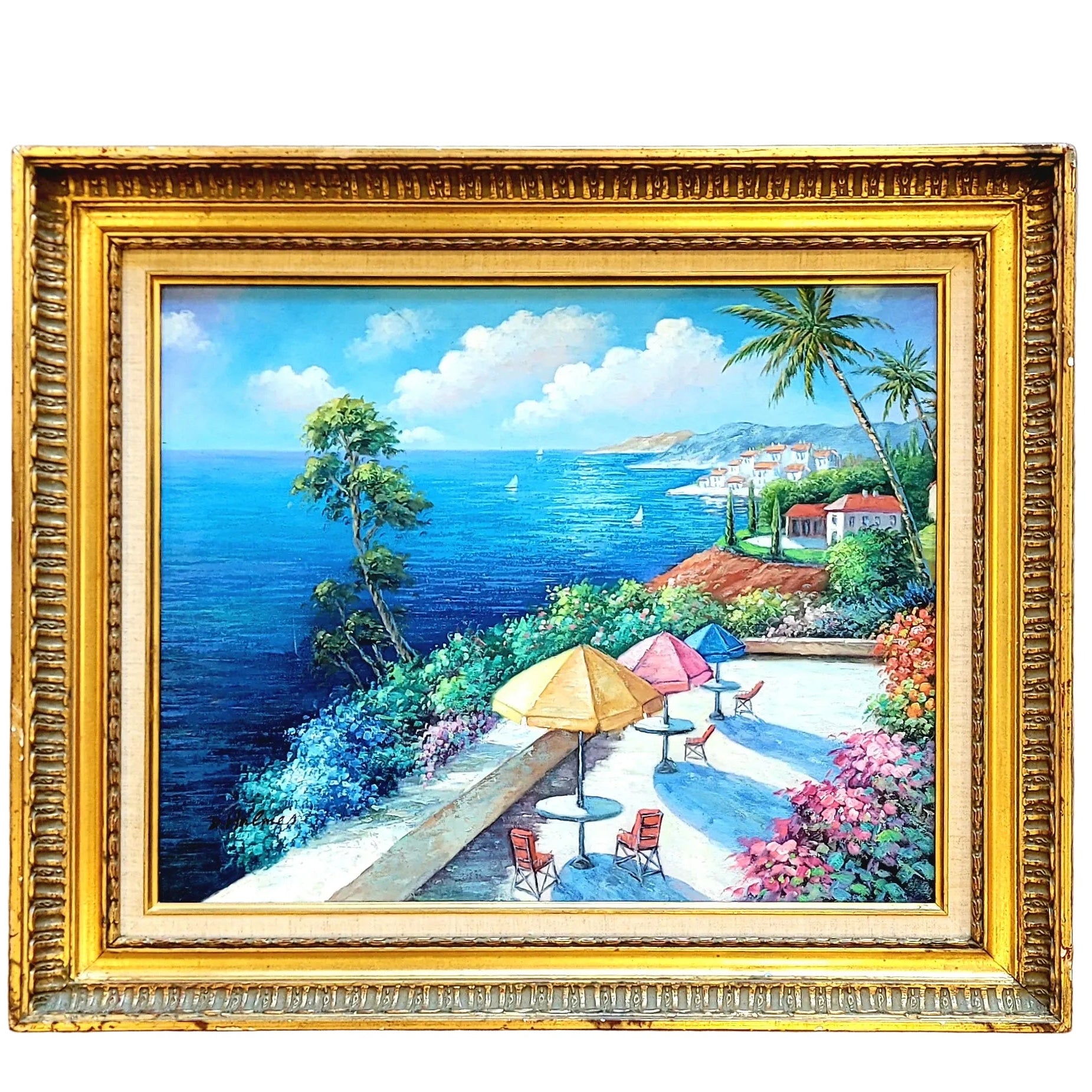 A framed painting depicting a vibrant tropical scene with palm trees, a blue ocean, and a colorful beachside town.